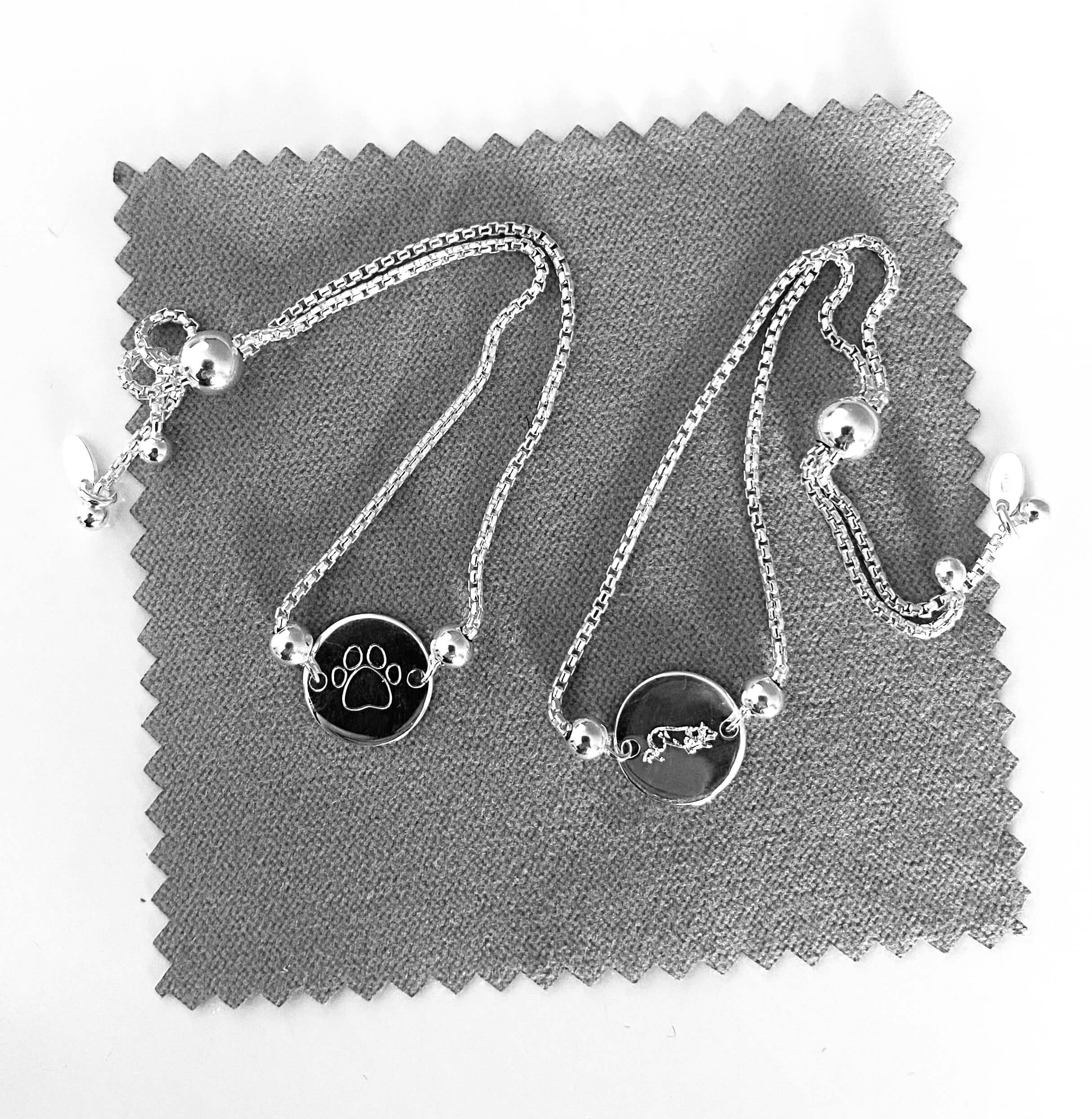 silver slider bracelet wth border collie and dog paw engraved designs
