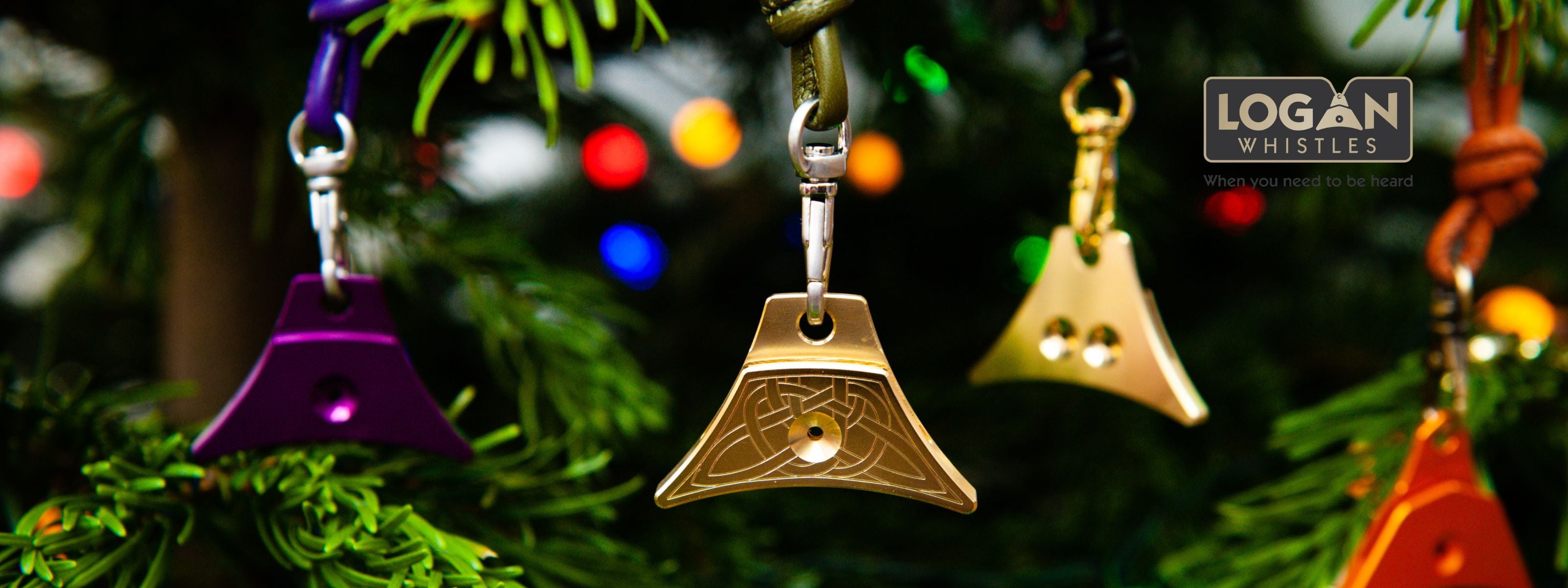 Logan Whistles on a Christmas tree