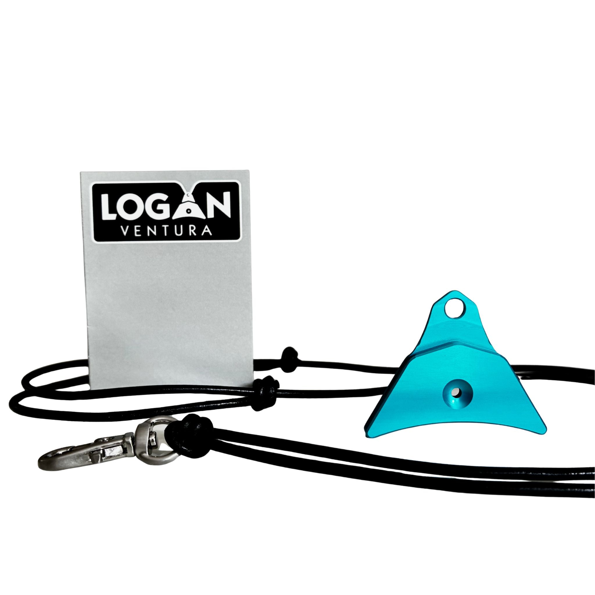 A turquoise anodised Logan ventura sheepdog whistle attached to a black cord lanyard with a silver swivel clip, shown next to a silver label 'LOGAN VENTURA' on a white background.