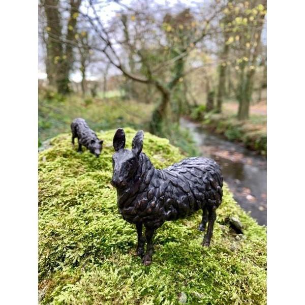 bronze sheep and collie figurine